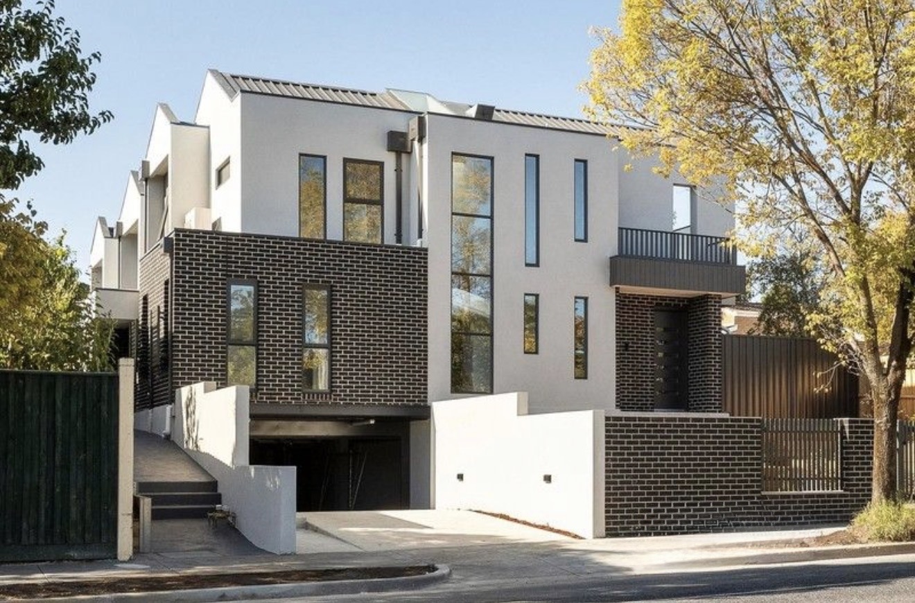 Contemporary townhouse construction, street view